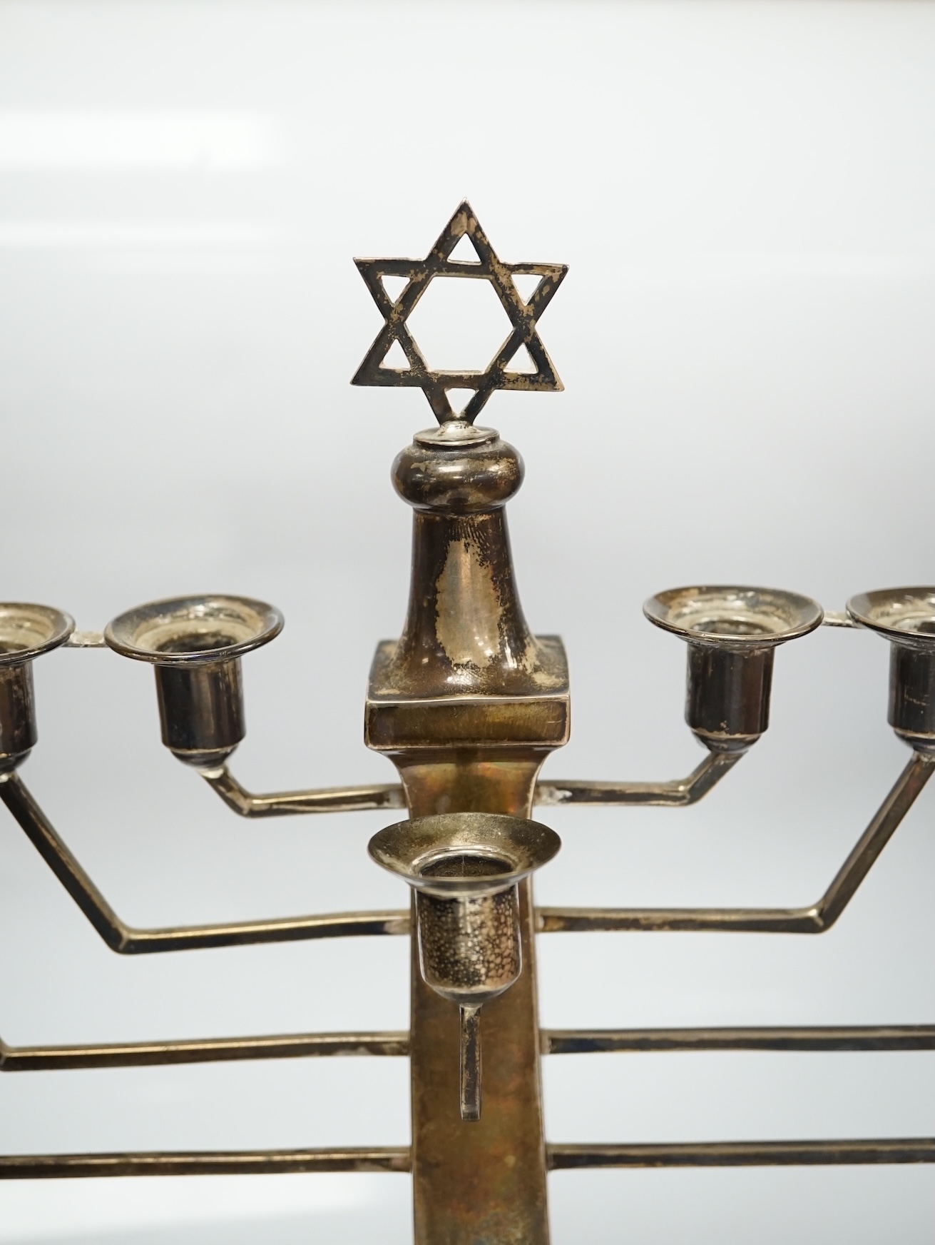 An Elizabeth II silver Hanukkah Menorah, by Alexander Smith, Birmingham, 1963, height 27cm, 12.3oz. Condition - fair to good